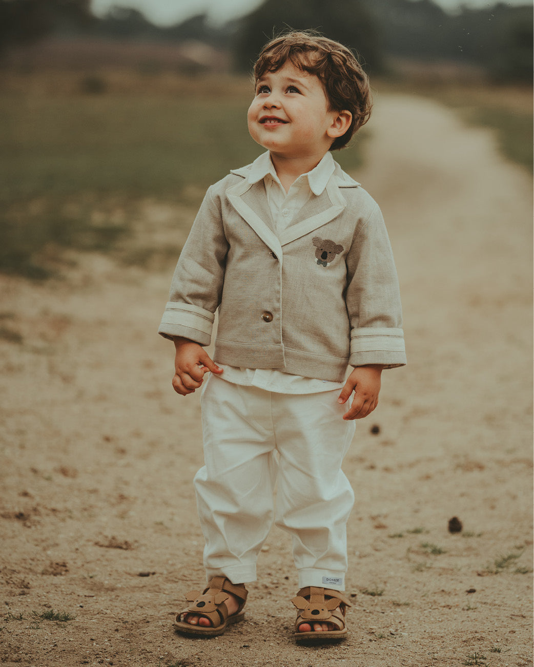 Donsje Amsterdam Baby Unisex Playsuit In Beige